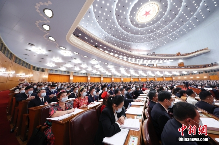 3月5日，十四屆全國人大一次會(huì)議在北京人民大會(huì)堂開幕。<a target='_blank' href='/'>中新社</a>記者 盛佳鵬 攝