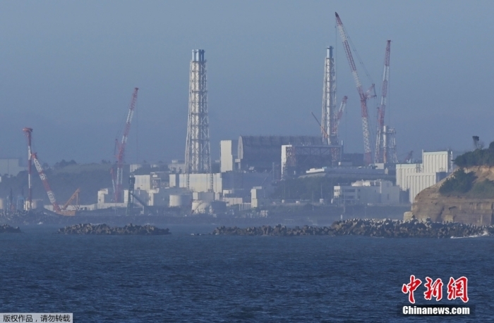 8月24日，從日本福島縣浪江町遠眺因海嘯受損的福島第一核電站。北京時間8月24日12時左右，日本正式開始排放福島第一核電站的核污染水。